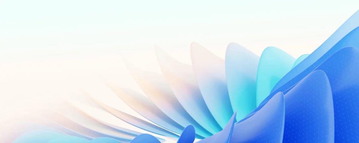 Abstract flowing layers transitioning from white to blue, creating a smooth wave-like design pattern